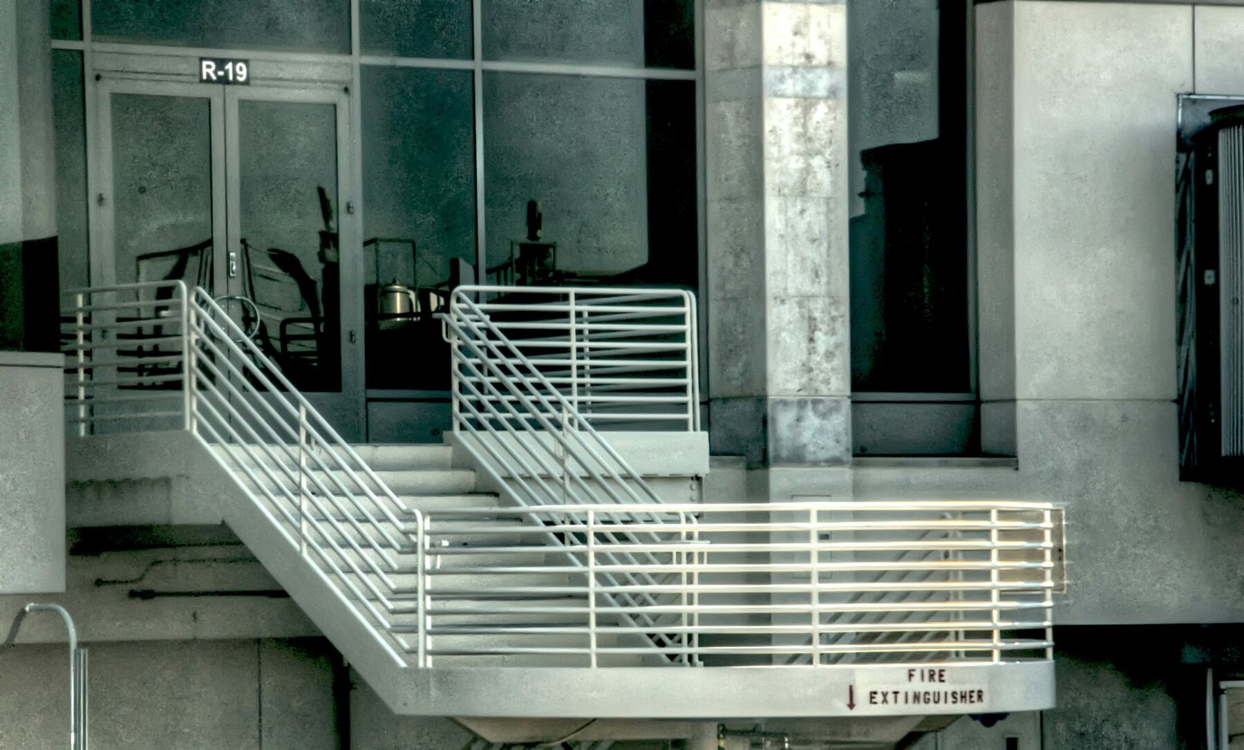 Steel staircase with bar railings